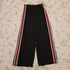 Razzle dazzle size small,  black with red and white side stripe